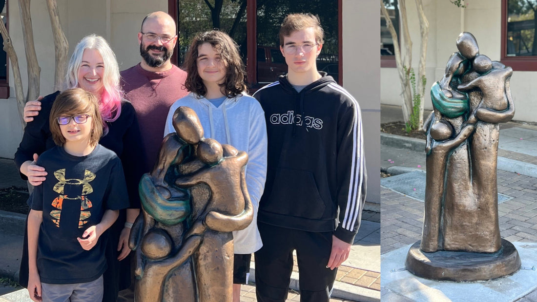 Elizabeth Bonura and her family next to the sculpture they inspired that won 1st place in the Georgetown Sculpture Tour