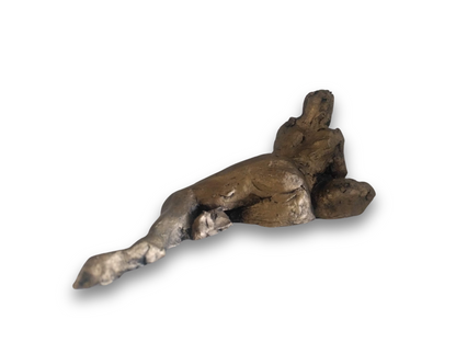 This sculpture is a study of the human form, capturing a reclining figure with an emphasized gesture. It is a beginner's piece in figure sculpture, sculpted in water-based clay, and measures approximately 9 inches in length. The work, showing a figure in a pose that suggests contemplation or rest, was created by Elizabeth Bonura.