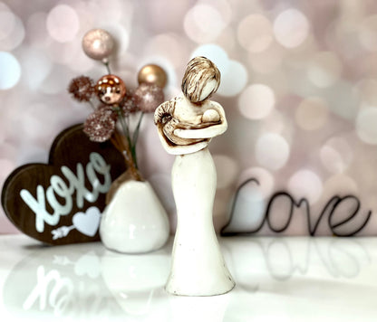 Love At First Sight Sculpture Of A Babywearing Mom