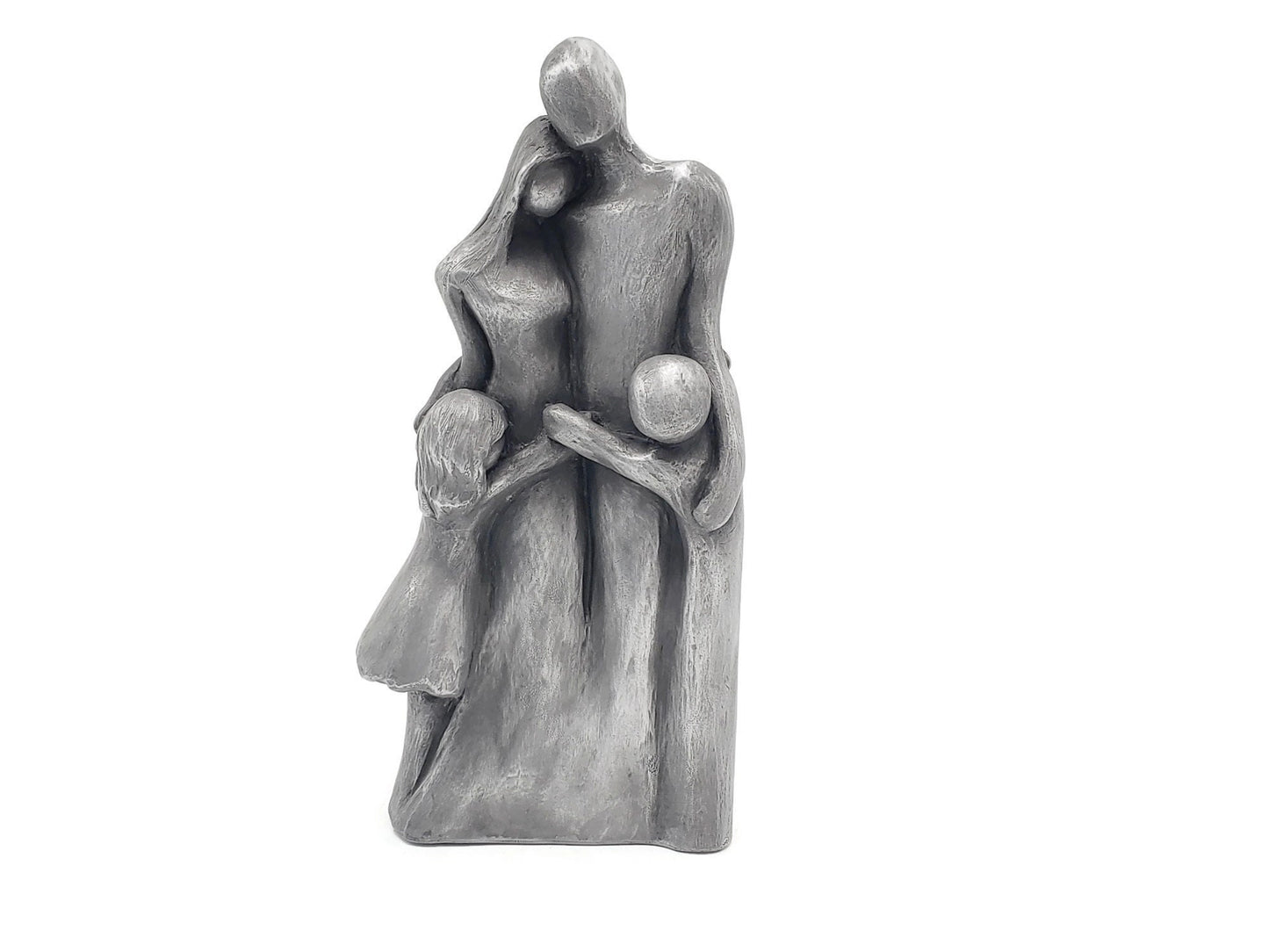 An aluminum family of four sculpture with two children hugging their parents - Family Hug!