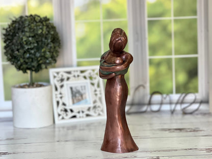 Love At First Sight Sculpture Of A Babywearing Mom